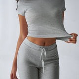 Essential Two-Piece Active Set ropped Short Sleeve Top Drawstring Flare Pants